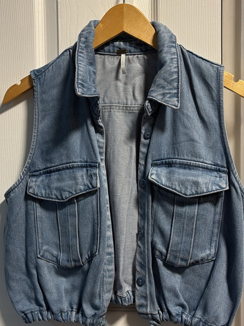 Sleeveless Denim Button-Down Vest in Light Blue